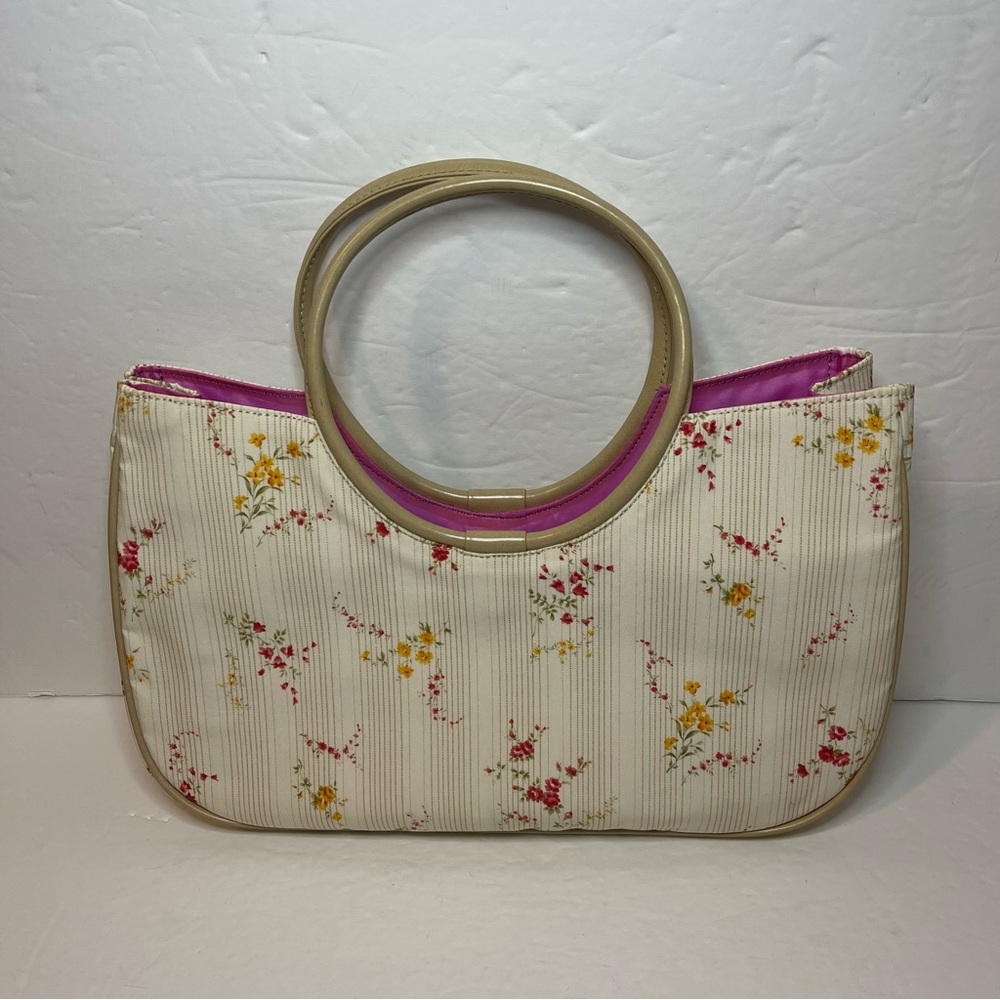 Women’s floral satchel with specialized handles